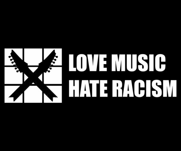 Crossed Guitars + Music Activism Slogan